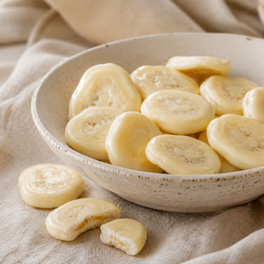 Translation missing: de.Bananenchips in weißer Schokolade