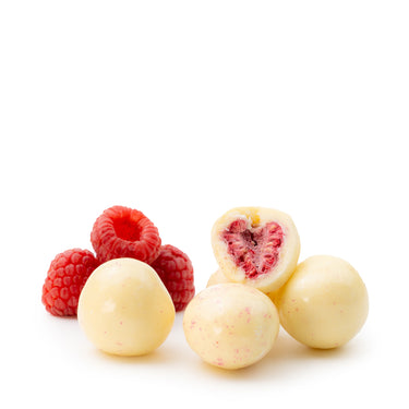 Translation missing: de.Gefriergetrocknete Himbeeren in weißer Schokolade von Snackberries – Himbeeren mit weißer Schokolade